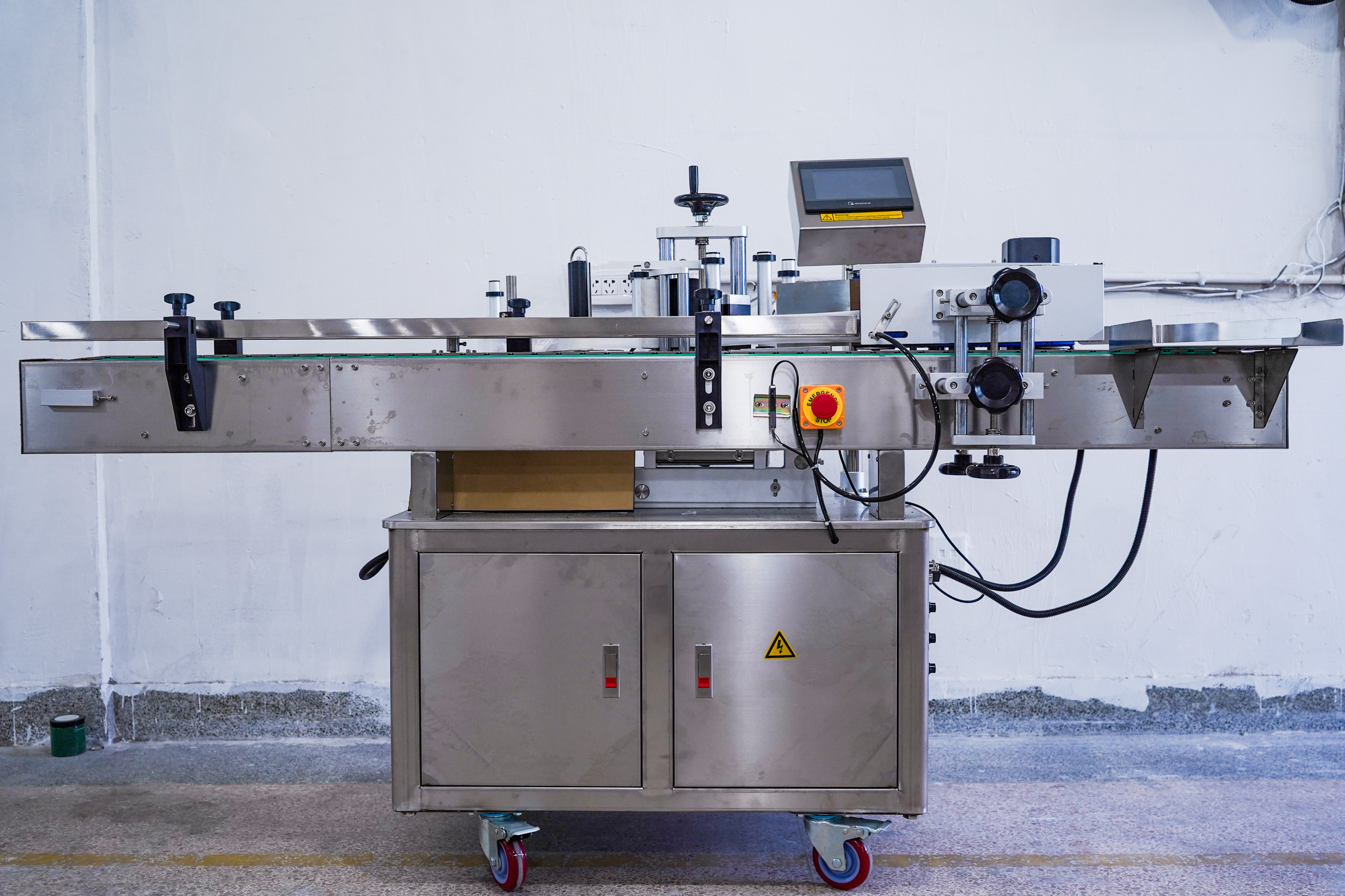 Labeling equipment photographed in a partner workshop